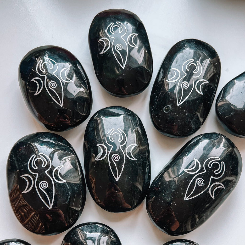 Obsidian goddess engraved palm stone