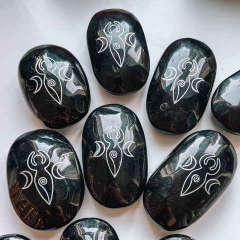 Obsidian goddess engraved palm stone